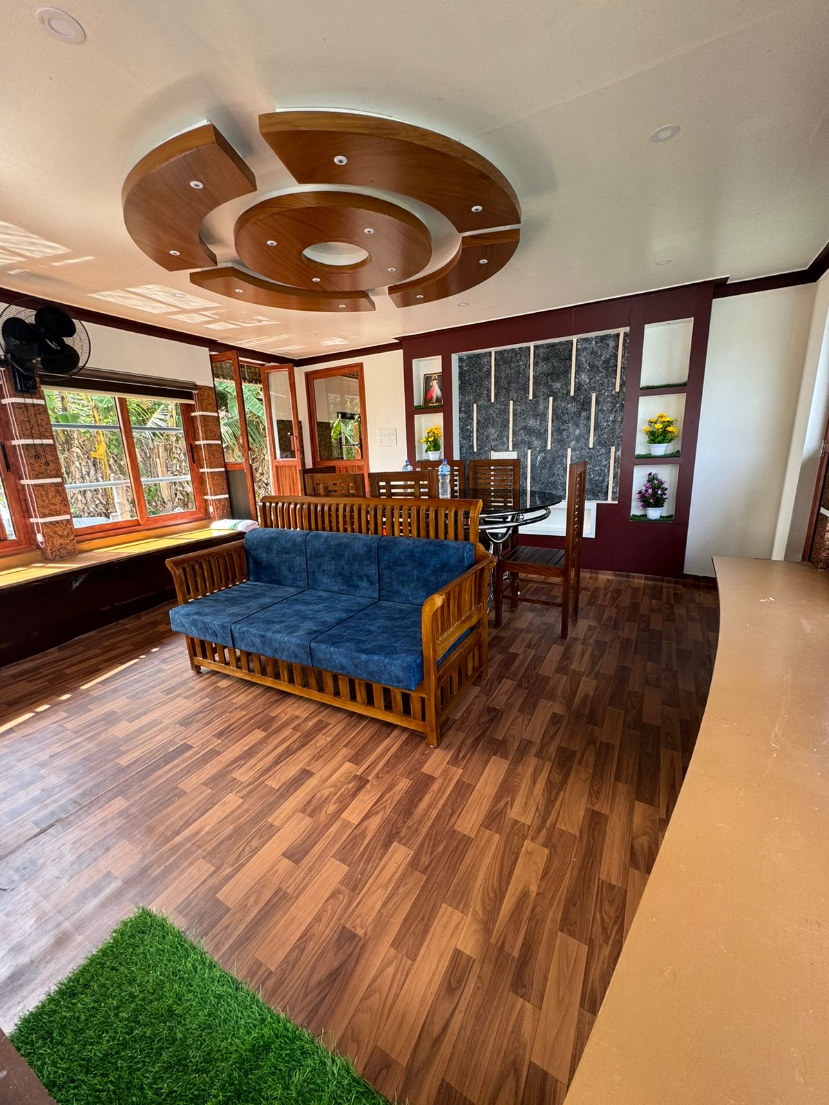 Wood-panelled lounge and dining space on Angel Houseboats